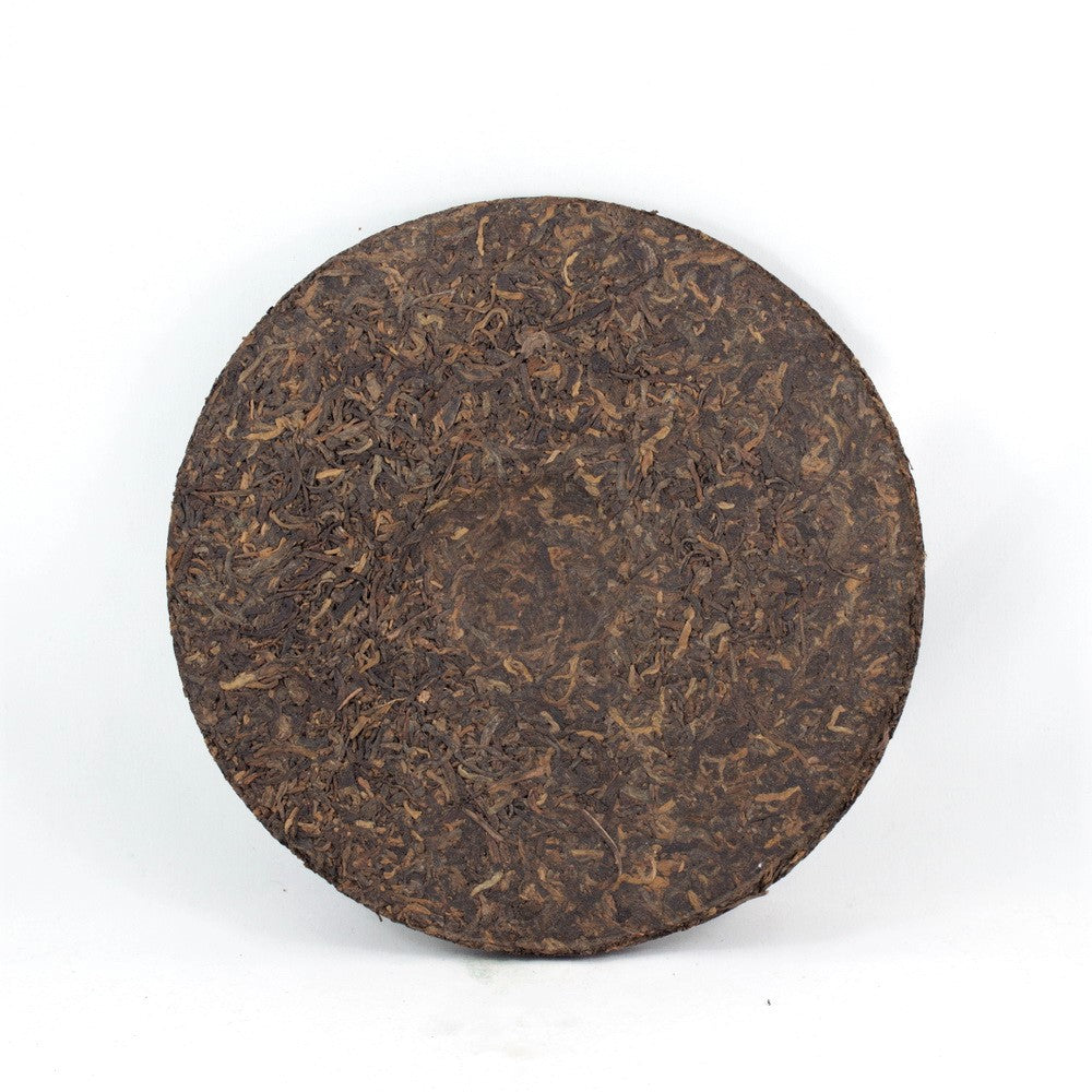 Pu-Erh Iron Mold Tea Cake, Golden Tips (Jin Ya), Chuan Long Tea Factory, 2003 (Ripe/Shou)