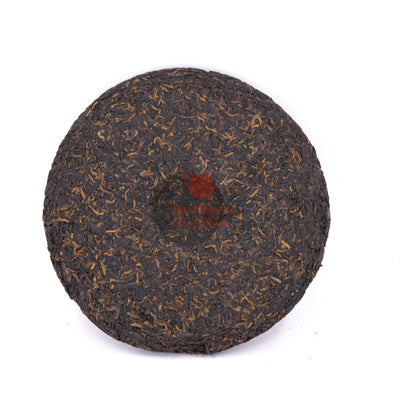 2005 Mengku Palace Tea Cake，(Ripe/Shou)